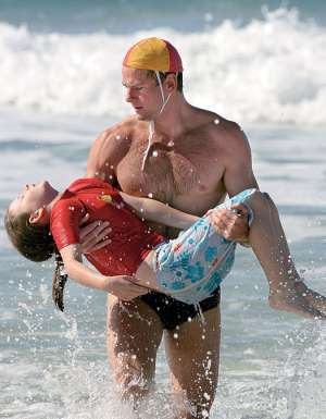Worship the gods of the beach: surf lifesavers - Image by Harvie Allison