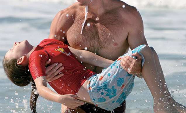Worship the gods of the beach: surf lifesavers - Image by Harvie Allison
