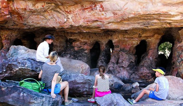 Discovering rock art at Mt Borradaile's catacombs.