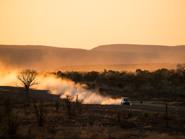 driving along Gibb River Rd at dusk