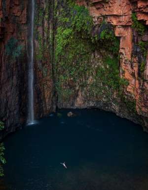 Woman swims at Emma Gorge in WA