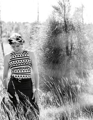 Black and white Claudia Karvan in the outback.