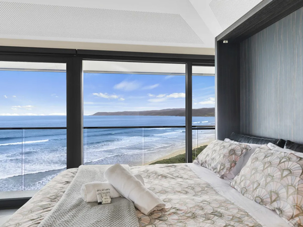 the bed with ocean views at The Pole House Fairhaven