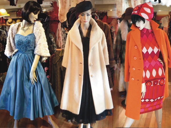 mannequins wearing dresses on display