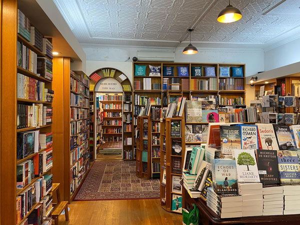 books on display inside Megalong Books, Leura