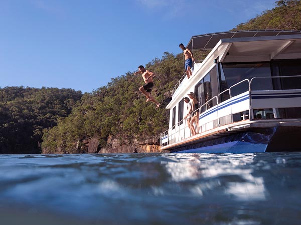 Jumping off a houseboat on the Hawkesbury River