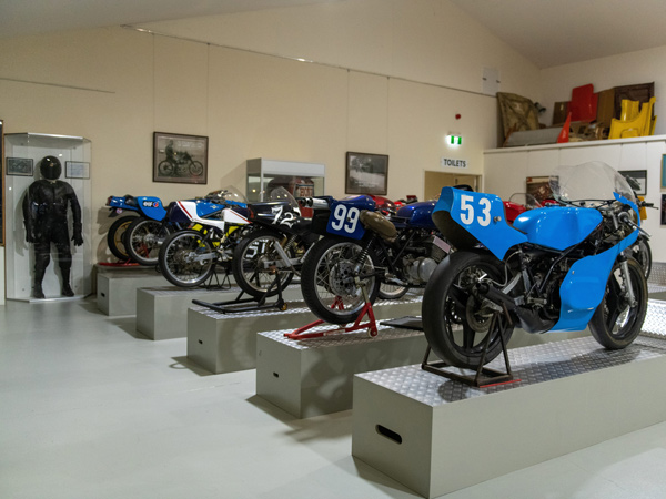 a display of motorcycles inside the National Motor Racing Museum, Bathurst