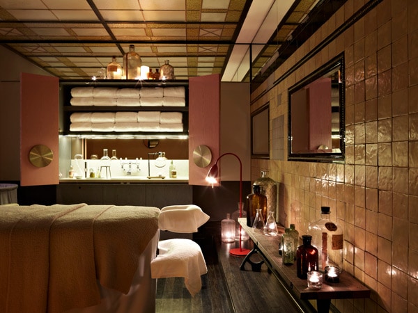 a dimly lit spa treatment room at SpaQ Sydney