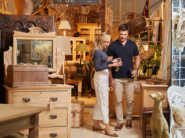 a couple browsing through antique items at Dirty Janes Bowral