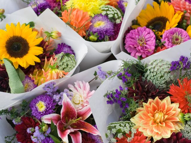 fresh flowers in hand-wrapped bouquets