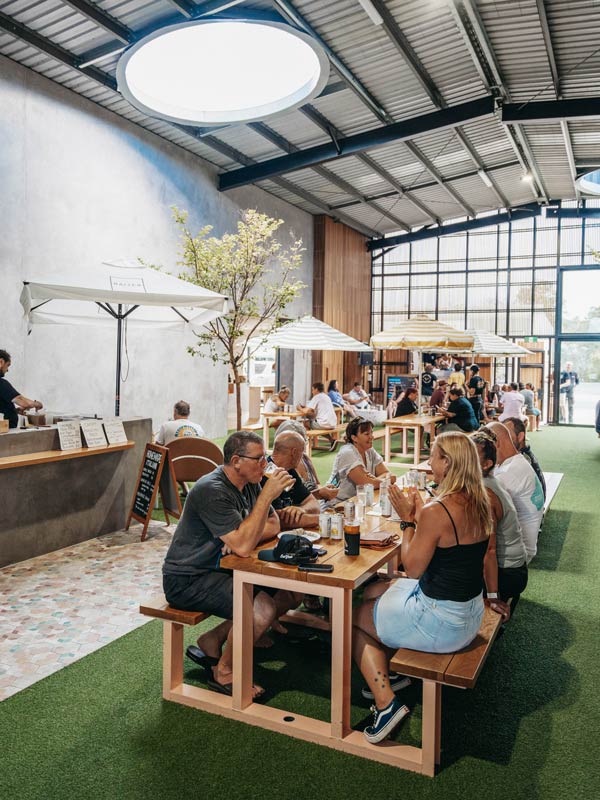 a group of guests drinking and dining at Balter Brewing Company, Gold Coast