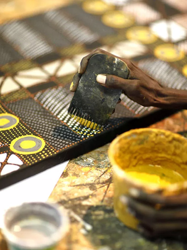 Creating an artwork on Tiwi Islands, Northern Territory