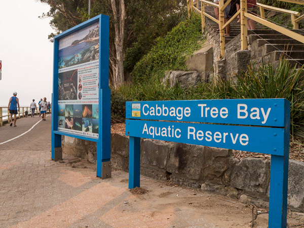 a signage of Cabbage Tree Bay Aquatic Reserve, Manly