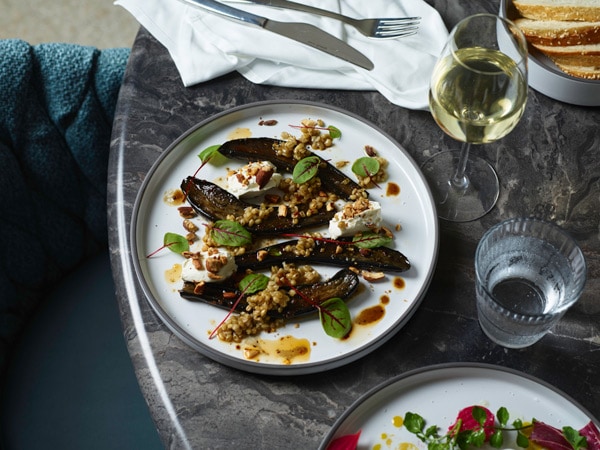 a plate of food and drinks on the table at Blaq Restaurant + Bar, Blackheath