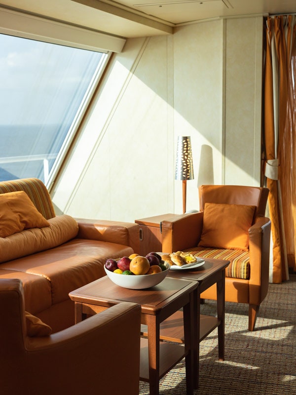 the seating area at Carnival Captain's Suites 