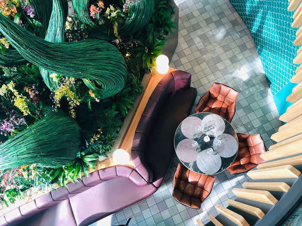 a nature-themed interior at Celebrity Edge Eden Restaurant