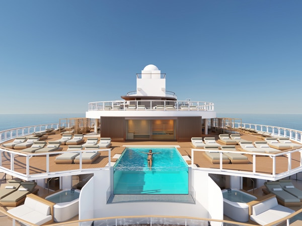 a woman dipping in a sundeck pool at Norwegian Prima cruise ship, Australia