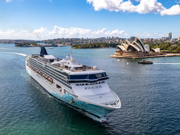 an aerial view of the Norwegian Spirit across Sydney Harbour