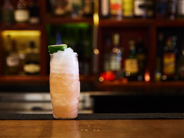 a glass of cocktail on the table at Papa Gede's Bar, Sydney