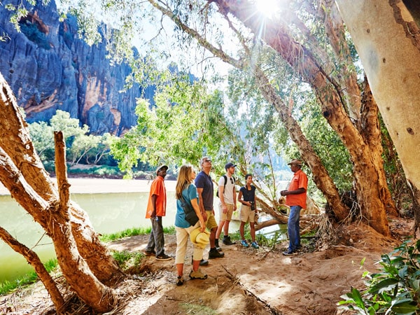a group of people touring along Windjana Gorge