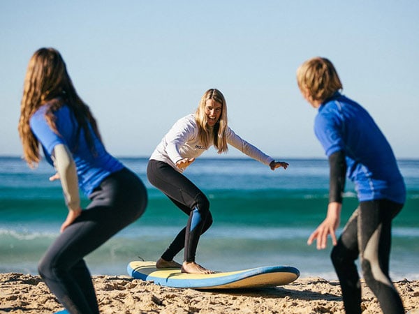 Learning to surf in Mollymook at the Pam Burridge Surf School on the NSW South Coast 