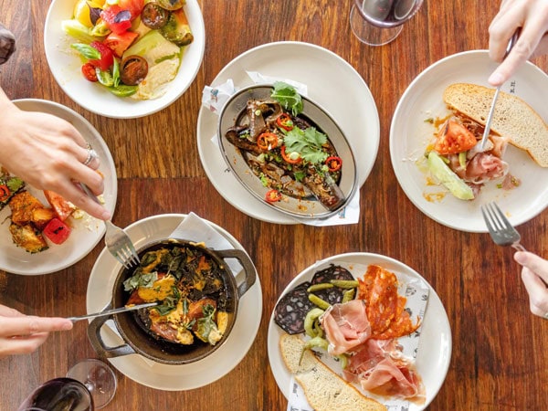 a table-top view of food plates on the table, Jackalope