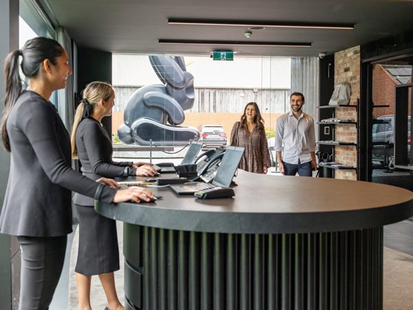 a couple entering the reception area at Jackalope