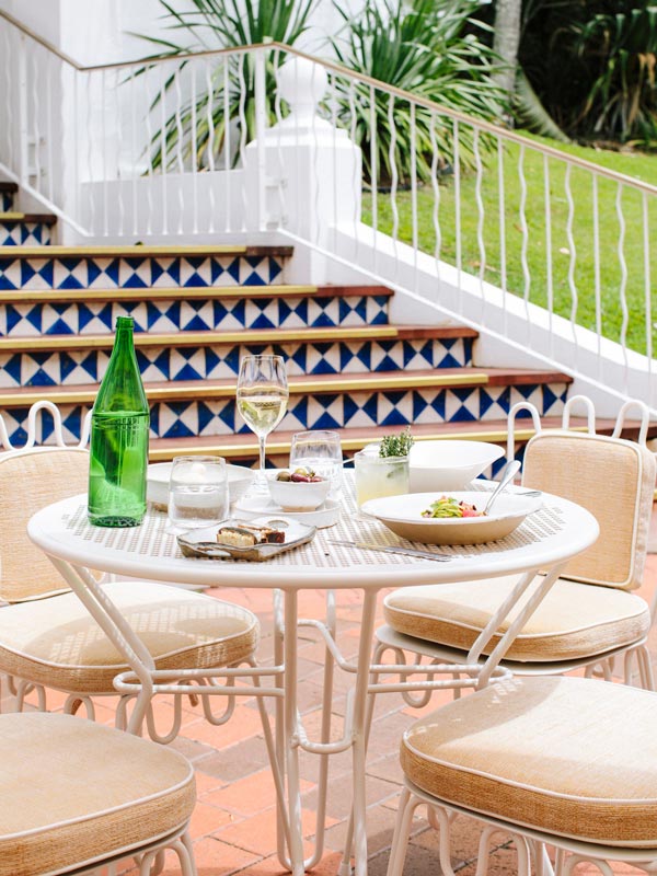 an al fresco drinking and dining spot at Raes Cellar Bar