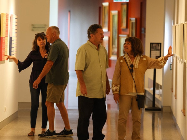 guests admiring artworks at Murwillumbah