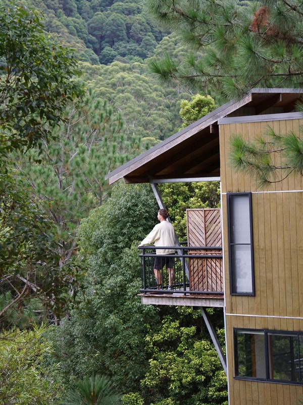 a man on the balcony at Ecoasis Retreat