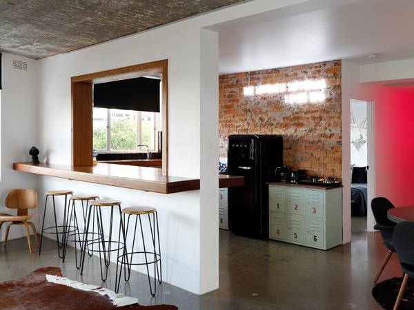 the dining and kitchen interior at Pink Hotel 