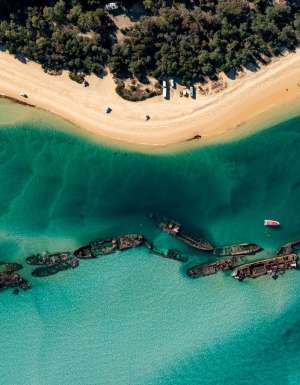 an aerial view of The Wrecks Campground, Moreton Island