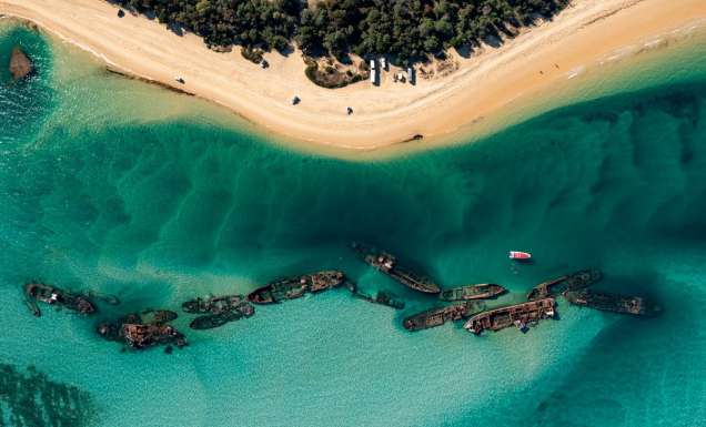 an aerial view of The Wrecks Campground, Moreton Island