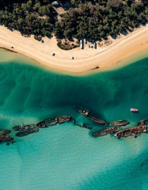 an aerial view of The Wrecks Campground, Moreton Island