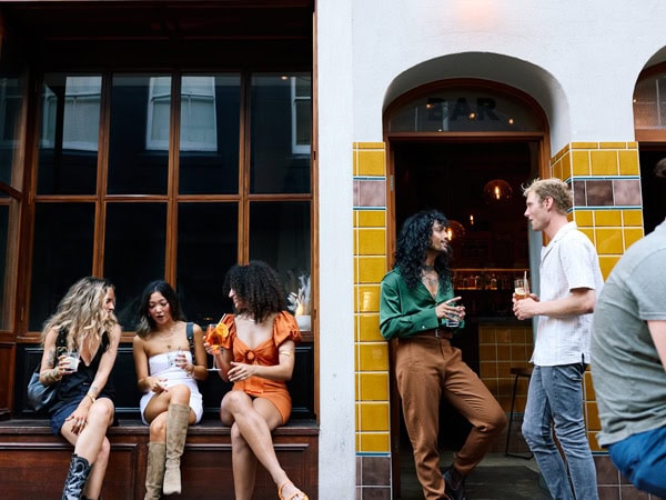 friends drinking outside Peel Street, Adelaide
