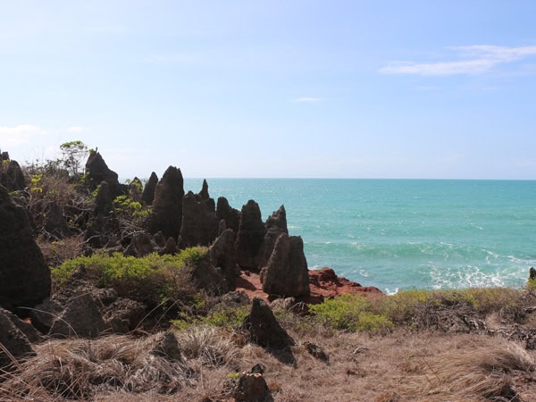 craggy rocks by the shore at Dhimurru Coastal Walking Trail