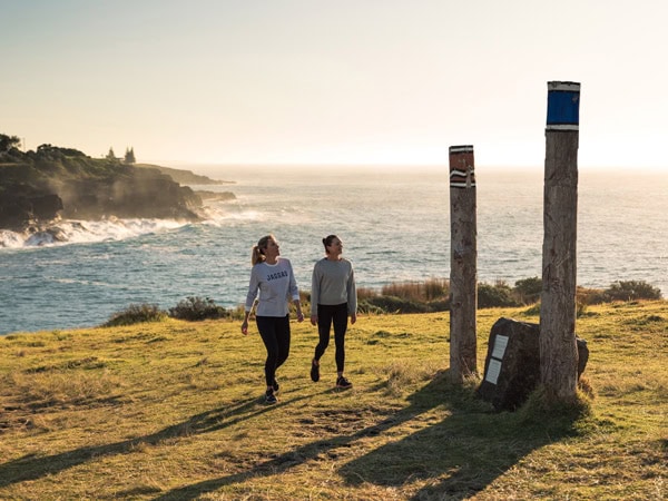 two people walking along the Kiama Coast Walk