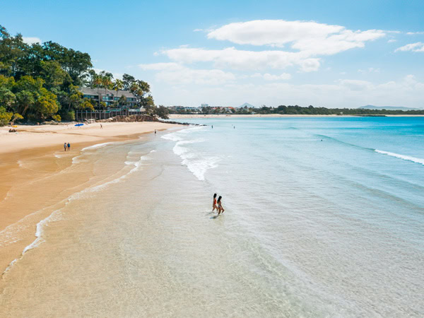 an aerial view of the beach at Noosa Coastal Walk