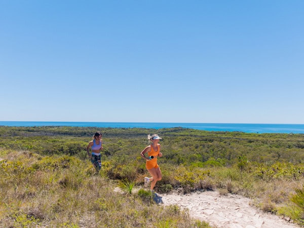 two people jogging along Noosa Coastal Walk
