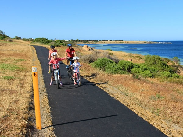 kids riding a bicycle along the Walk the Yorke trail