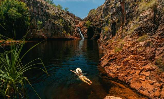 a girl swimming in Maguk in Kakadu
