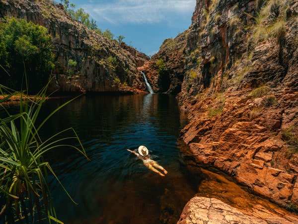 a girl swimming in Maguk