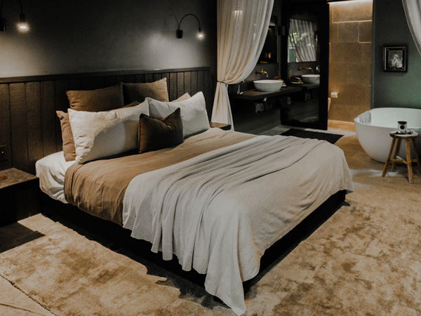 a bedroom with bathtub at The Bower, Byron Bay