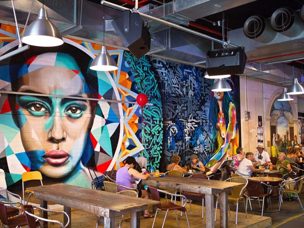 a colourful mural at a dining spot in the Adelaide Central Market