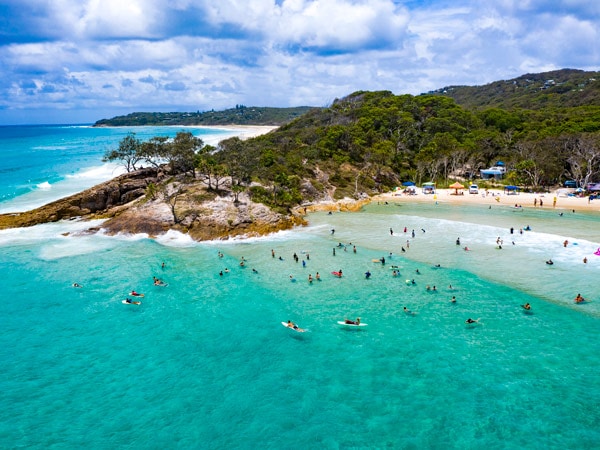 Surfers in the water.