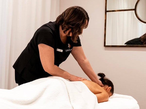 a woman undergoing a massage treatment at Davaar House, Adelaide