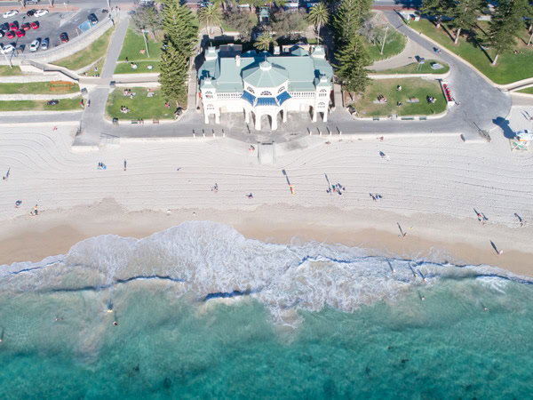 an aerial view of the white-sand beach at Cottesloe Beach, Perth