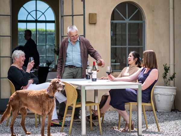 friends enjoying a wine-tasting session at HOOSEGG, Orange