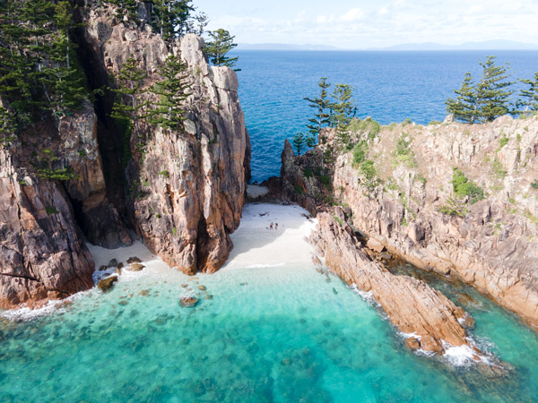 rock formations and white-sand beach on Hayman Island, Great Barrier Reef