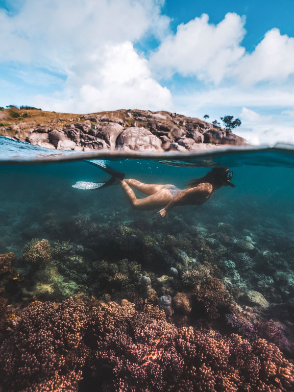 a woman snorkelling at Lizard Island, Great Barrier Reef